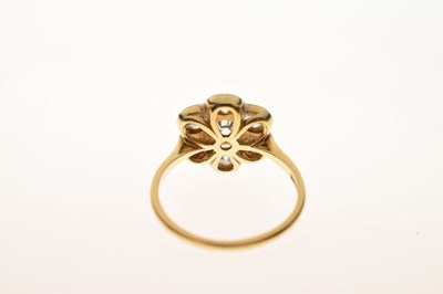 Lot 11 - Diamond 18ct yellow gold and platinum flower head ring
