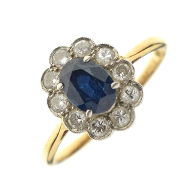 Lot 32 - Sapphire and diamond '18ct & Plat' cluster ring