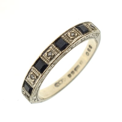Lot 30 - Sapphire and diamond 18ct white gold half eternity ring