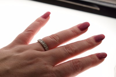 Lot 10 - Diamond 18ct white gold half eternity ring