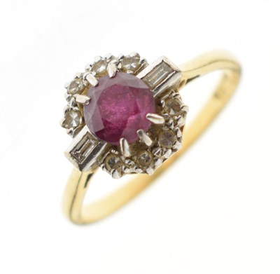 Lot 41 - Ruby and diamond 18ct gold cluster ring