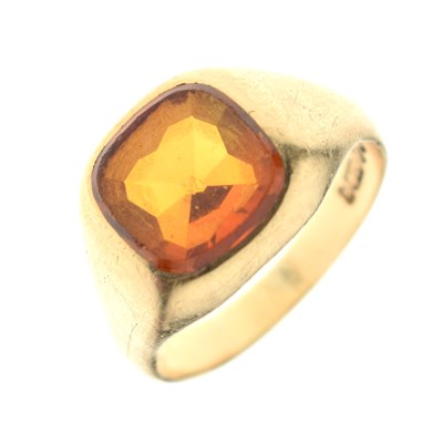 Lot 42 - 9ct gold ring set an orange-coloured faceted cushion-shaped stone