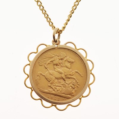 Lot 299 - George V gold sovereign, 1912, in a 9ct surround