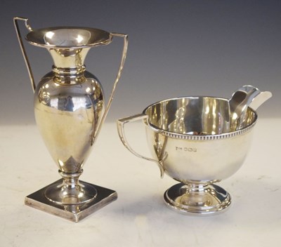 Lot 190 - George VI silver milk jug, together with a George V silver trophy vase