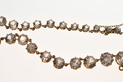 Lot 55 - Yellow metal and white paste rivière necklace