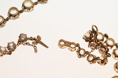 Lot 55 - Yellow metal and white paste rivière necklace