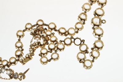 Lot 55 - Yellow metal and white paste rivière necklace