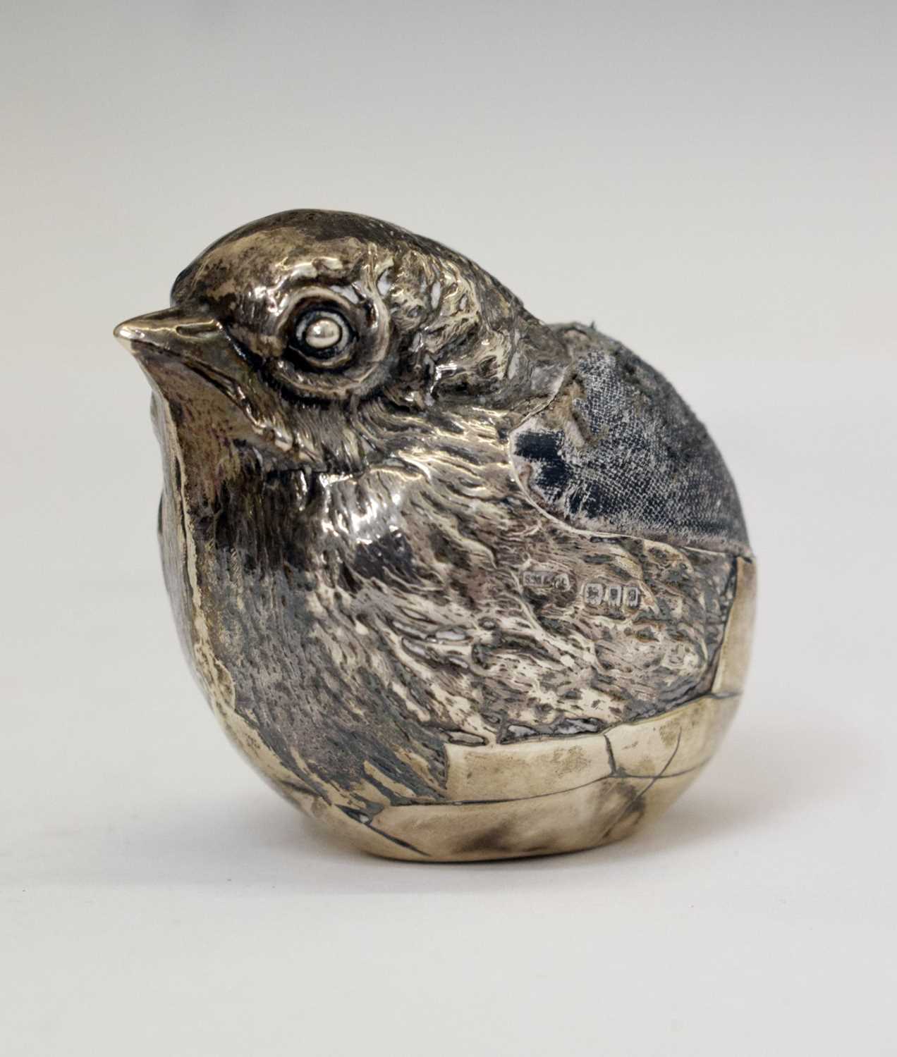 Lot 92 - Edward VII silver novelty pin cushion in the form of a hatching chick