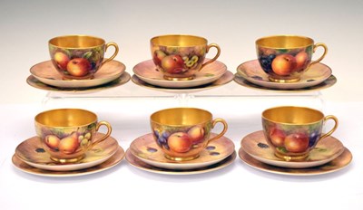 Lot 345 - Six Royal Worcester porcelain fruit painted cups, saucers and plates