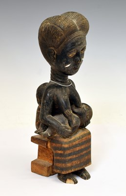 Lot 184 - Ethnographica - African carved wooden fertility figure, mother and two children
