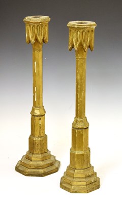 Lot 209 - Near pair of 18th century giltwood candlesticks, octagonal bases