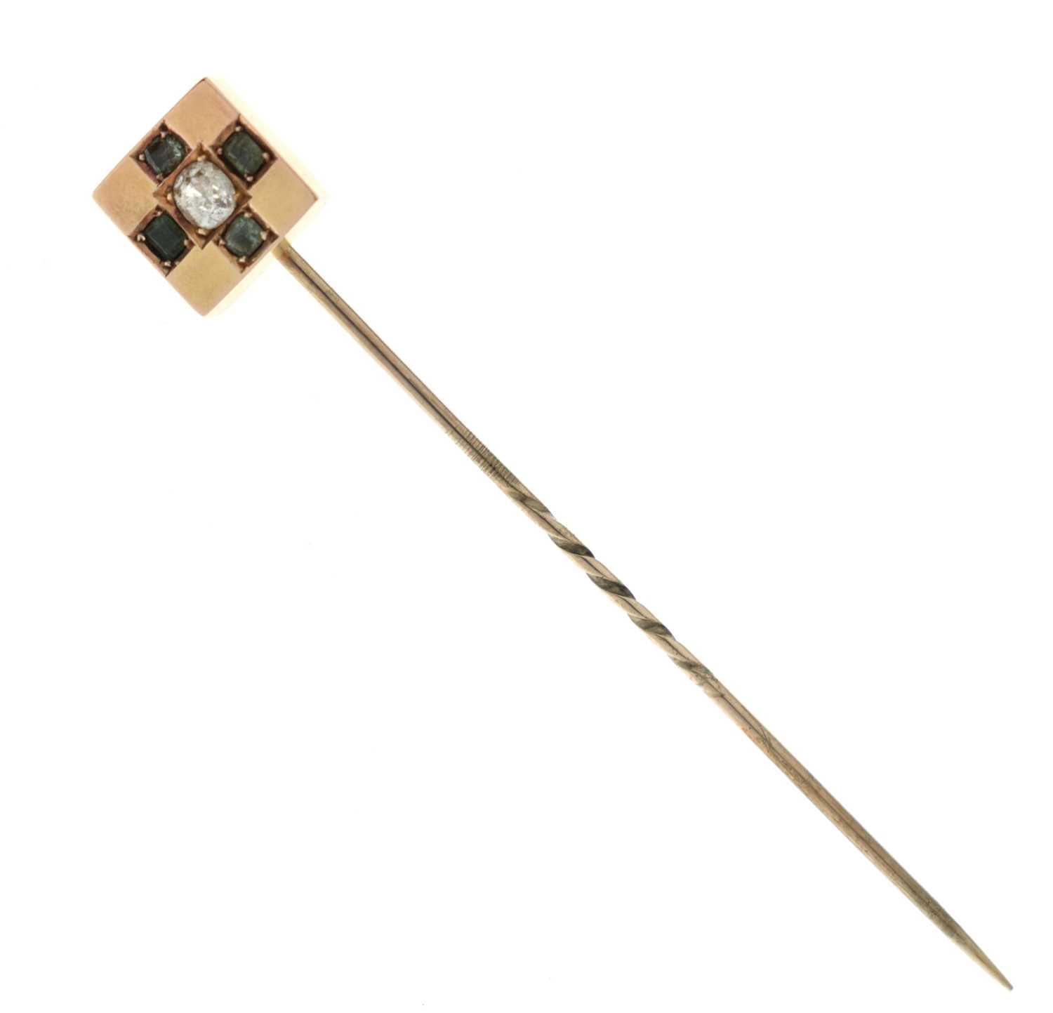 Lot 69 - Victorian diamond and green stone yellow metal stick pin