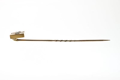 Lot 69 - Victorian diamond and green stone yellow metal stick pin