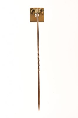 Lot 69 - Victorian diamond and green stone yellow metal stick pin