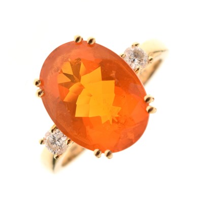 Lot 26 - Fire opal and diamond three-stone ring