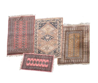 Lot 510 - Group of four Eastern-style rugs