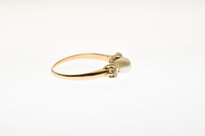 Lot 14 - Pearl and diamond yellow metal ring