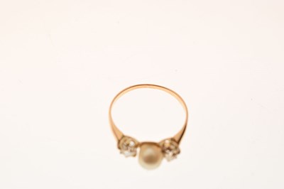 Lot 14 - Pearl and diamond yellow metal ring