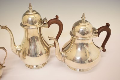 Lot 122 - Elizabeth II silver three-piece tea and coffee set