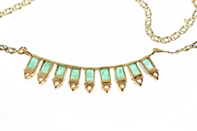 Lot 50 - Emerald and white stone 14ct yellow gold fringe necklace