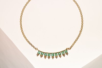 Lot 50 - Emerald and white stone 14ct yellow gold fringe necklace
