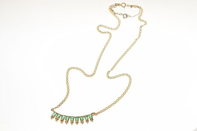 Lot 50 - Emerald and white stone 14ct yellow gold fringe necklace