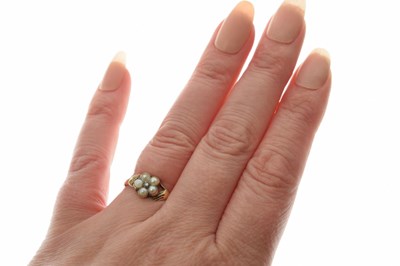 Lot 19 - 19th century Claddagh-style pearl and diamond forget-me-not ring