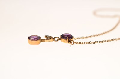 Lot 37 - Victorian amethyst and seed pearl yellow metal pendant necklace