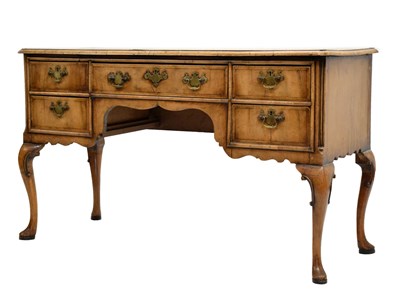 Lot 577 - Mid 18th century-style walnut kneehole desk or writing table