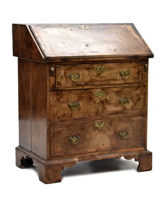 Lot 547 - Small early 18th century walnut, crossbanded and featherbanded bureau