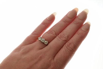 Lot 7 - 18ct yellow gold three-stone diamond ring