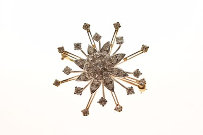 Lot 27 - Diamond yellow and white metal flower head starburst brooch