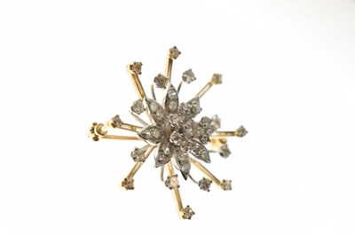 Lot 27 - Diamond yellow and white metal flower head starburst brooch