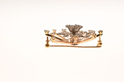 Lot 27 - Diamond yellow and white metal flower head starburst brooch