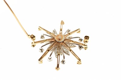 Lot 27 - Diamond yellow and white metal flower head starburst brooch