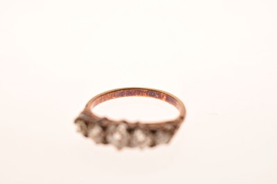 Lot 8 - Late 19th century diamond yellow metal ring, five graduated old cut diamonds