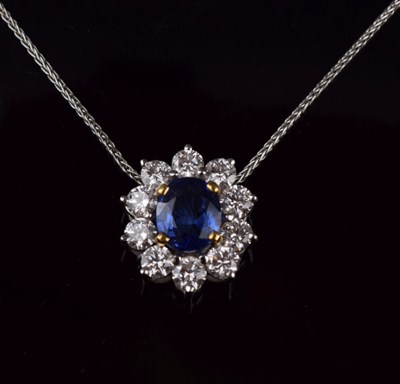 Lot 37 - Sapphire and diamond cluster pendant