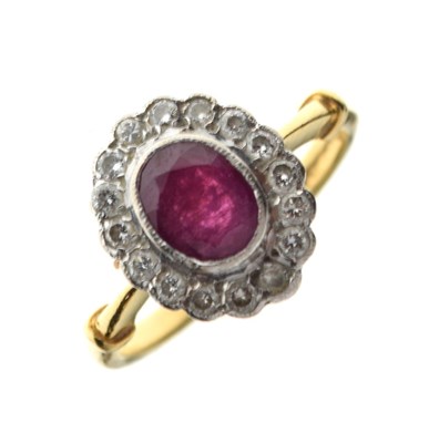 Lot 32 - 18ct gold, ruby and diamond cluster ring