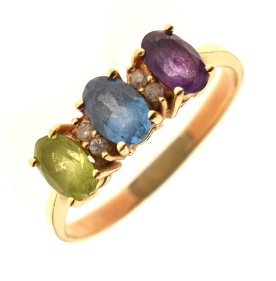 Lot 34 - Peridot, topaz, amethyst and diamond dress ring