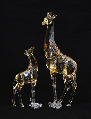 Lot 565 - Swarovski Crystal Collector's Society Giraffe Mudiwa 2018, and a Swarovski giraffe calf