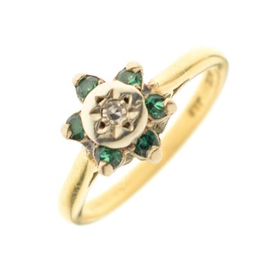Lot 13 - Diamond and green-coloured stone flower head cluster ring