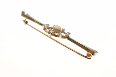 Lot 35 - Edwardian pearl and diamond yellow and white metal set bar brooch