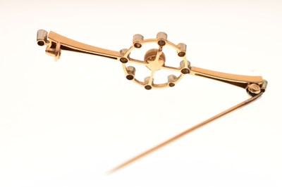 Lot 35 - Edwardian pearl and diamond yellow and white metal set bar brooch