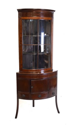 Lot 493 - Inlaid mahogany bowfront corner cupboard
