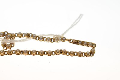 Lot 45 - Late 19th century seed pearl yellow metal pendant necklace
