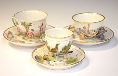 Lot 331 - Three Capodimonte cups and saucers