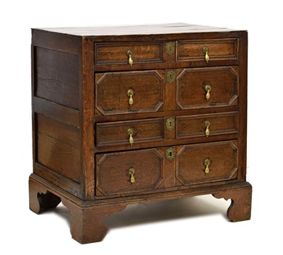 Lot 455 - Late 17th century oak geometric chest of drawers