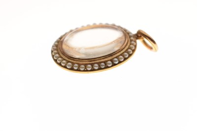 Lot 43 - Late 19th century seed pearl 15ct yellow gold locket pendant