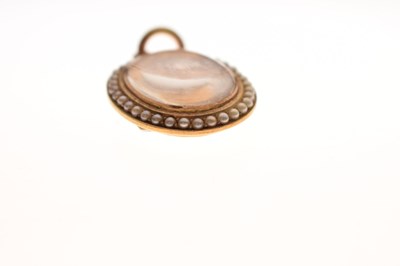 Lot 43 - Late 19th century seed pearl 15ct yellow gold locket pendant