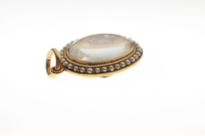 Lot 43 - Late 19th century seed pearl 15ct yellow gold locket pendant